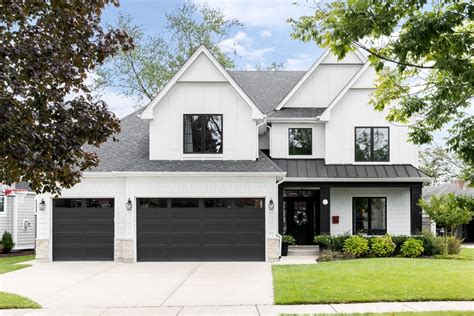 white house black shutters metal roof|white house black trim exterior.